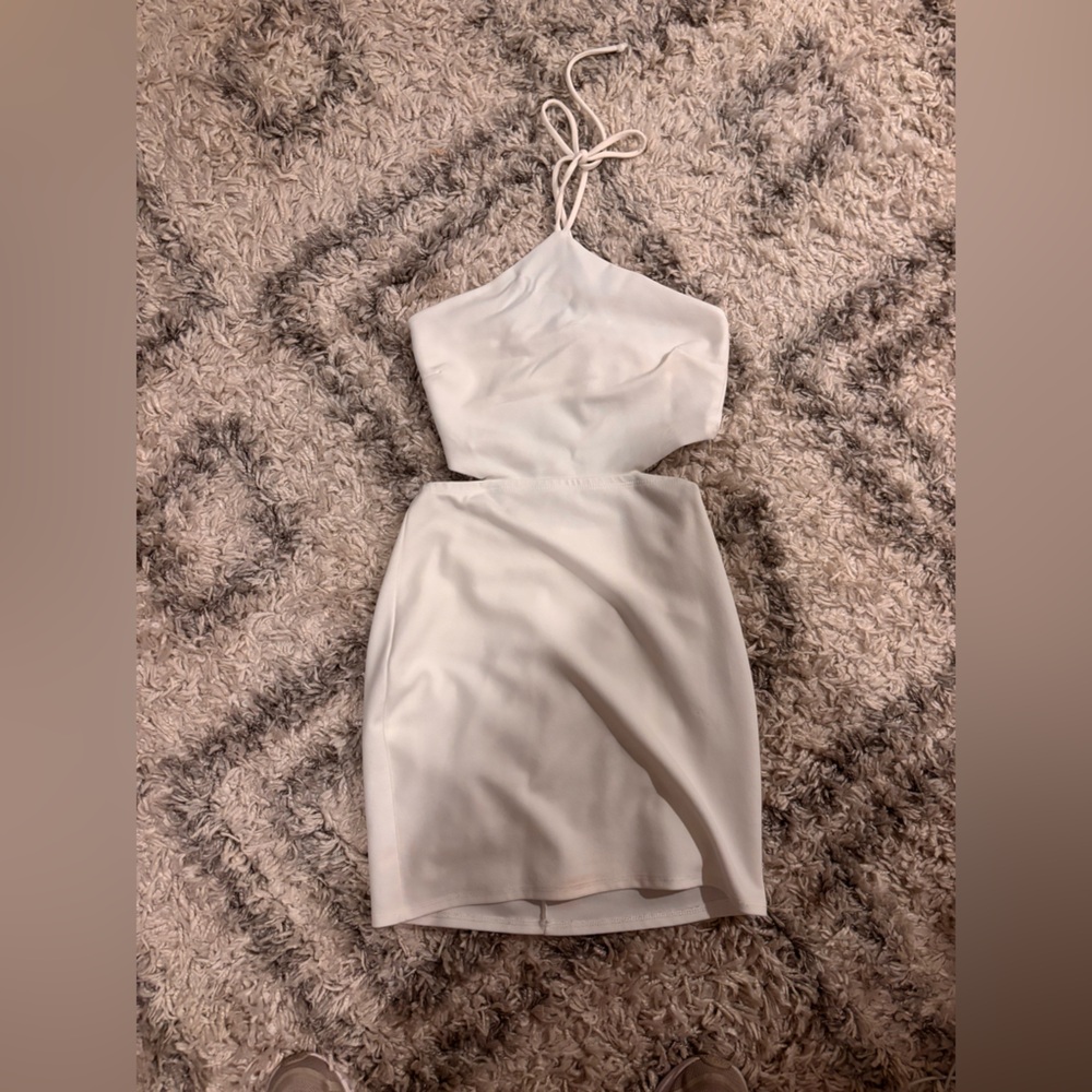 White dress with cutouts on side/back